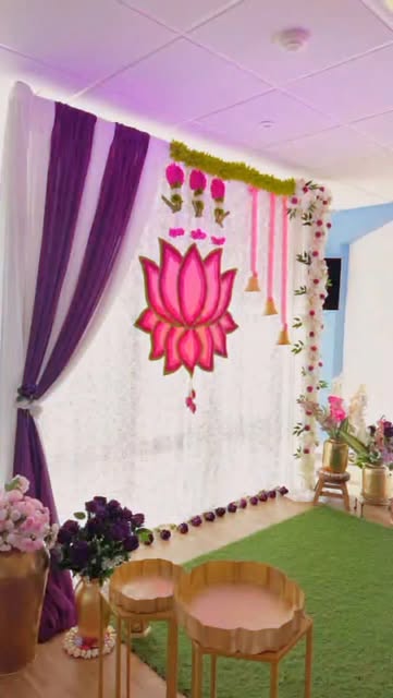 White fairy-light curtain backdrop with navy and silver balloon garlands